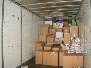 Packing the truck with 43,000 of hurricane relief supplies.